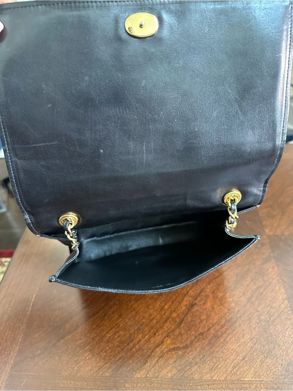 CHANEL Black Quilted Lambskin Shoulder Bag with Gold Chain Detail